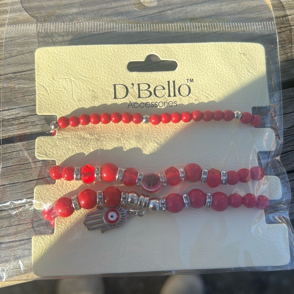 D’nello new evil eye, and hamss necklace red